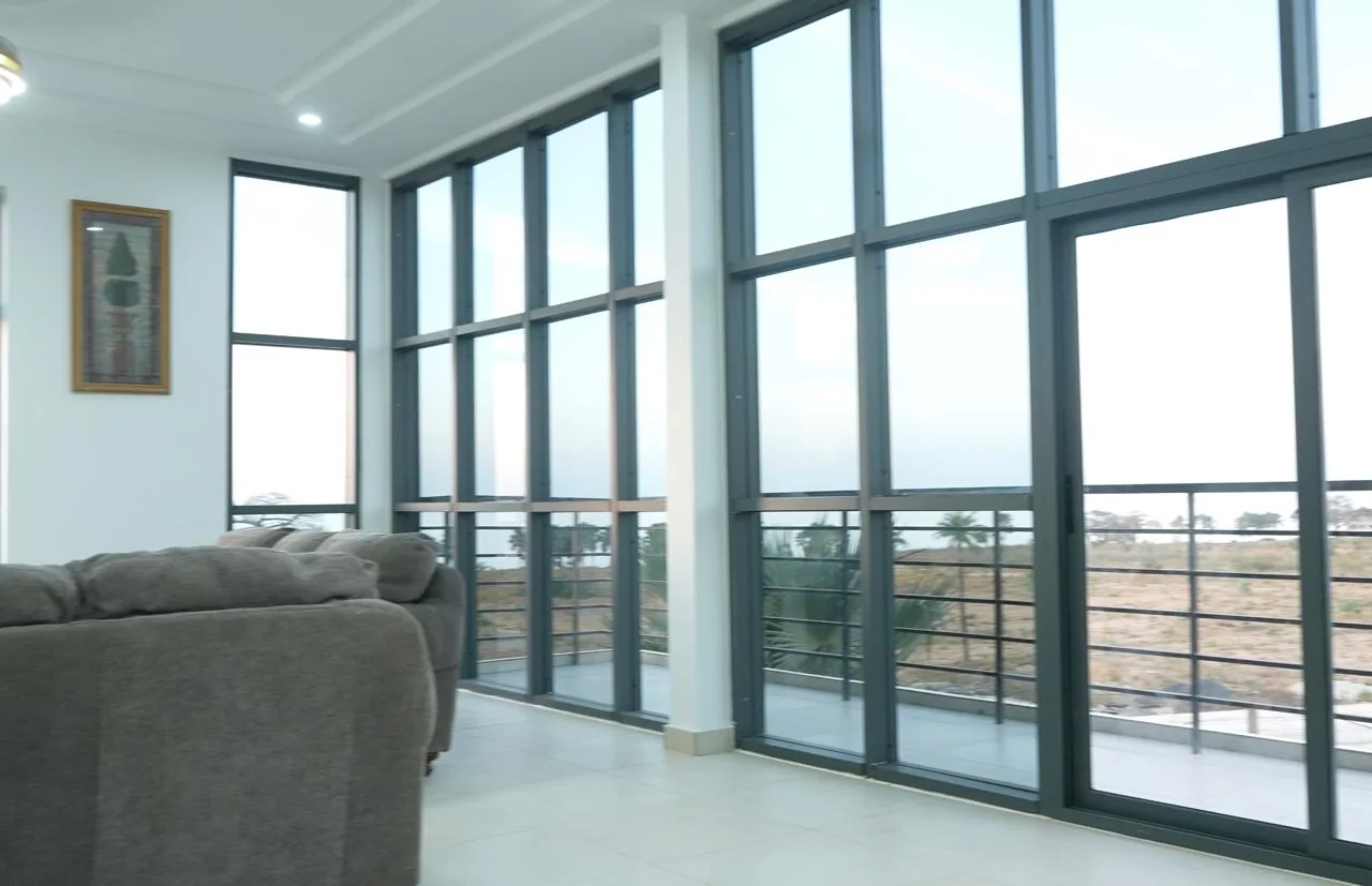 Ocean Breeze penthouse living room with balcony light