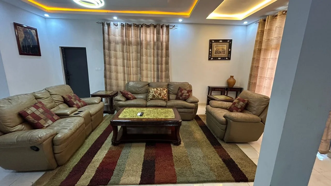 Senegambia Villa — grand 3-bedroom living room with glass wall